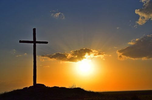 cross at sunset - celebrate Easter